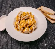 Пельмени с курицей в медово-горчичном соусе жаренные 10 шт | SakhFood